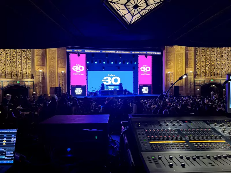 Digital mixing console at front of house during a corporate event